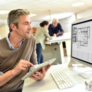 looking at blueprints on a computer